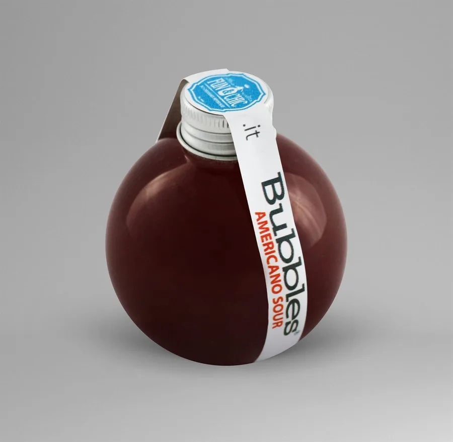 La prima Bubbles: sfera rossa con fascetta bianca verticale, Bubbles Americano Sour